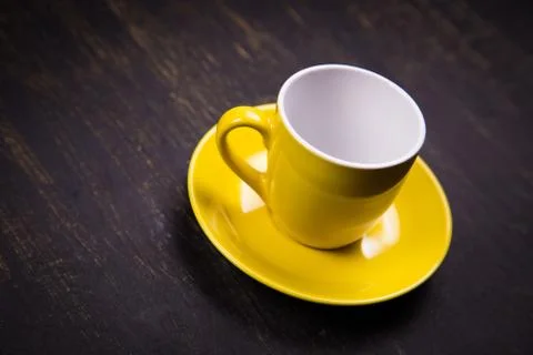 Empty yellow cup Stock Photos