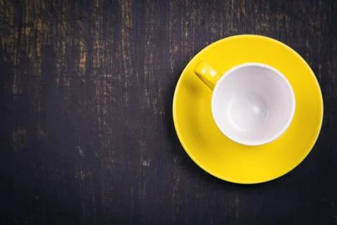 Empty yellow cup Stock Photos