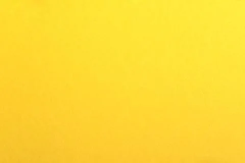 Empty yellow paper backgrounds. Clean color texture with simple surface. Stock Photos