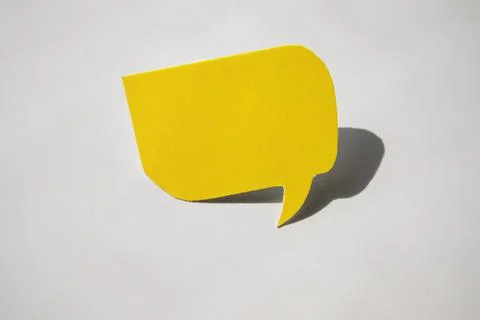 Empty yellow paper dialogue with a speech bubble on a balloon for your design Stock Photos
