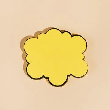 Empty yellow speech bubble beige background. High resolution photo Stock Photos