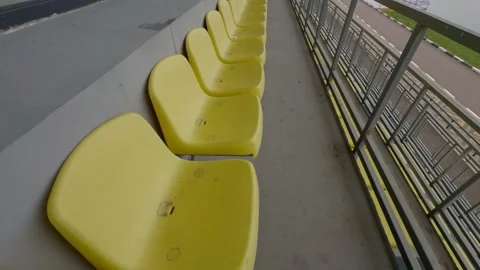 Empty Yellow Stadium Seats Awaiting for Spectators to Fill Them Up and Enjoy Stock Footage 313287097