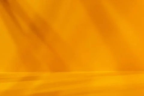 Empty yellow studio space with deep artistic shadow Foto stock