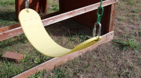 Empty Yellow Swing in the Wind 1 Video stock 45763112