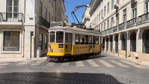 Empty Yellow Tram No. 25 Rounds Lisbon's Rua Dos Fanqueiros Corner 1080p Stock Footage 252872337