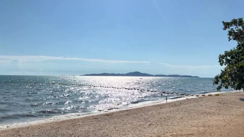 EmptyBeachSeaViewKohLarnislandthroughtrees Stock Footage 306534556