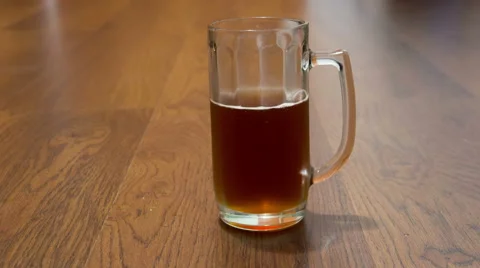 Emptying beer mug, time lapse Stock Footage 55077680
