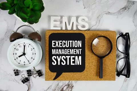 EMS - Execution Management System acronym with alarm clock and magnifying g.. 스톡 사진