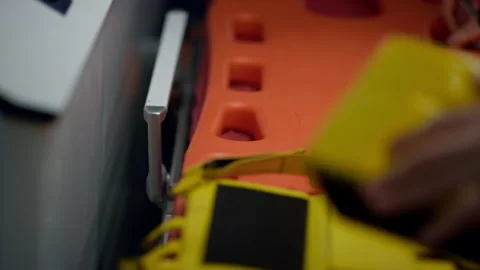 EMS paramedics hands getting ready medical equipment for injuring patient Video stock 166843964