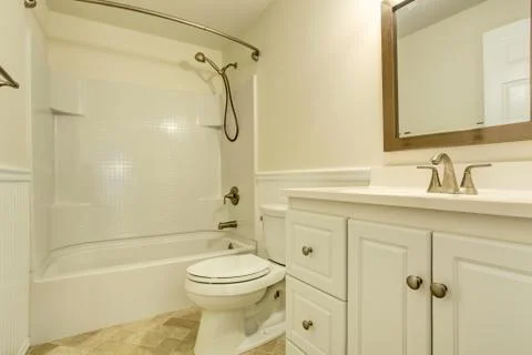 Emtpy white bathroom interior Stock Photos