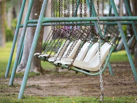 Emtry swing in play park Stock Photos