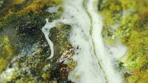 Emulsion drip glitter ink spill white gold wave Video stock 278568539