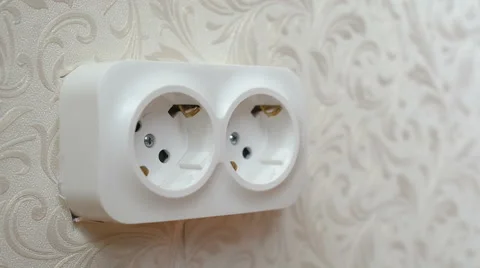 Enabling and disabling plug into the wall socket Stock Footage 56139546