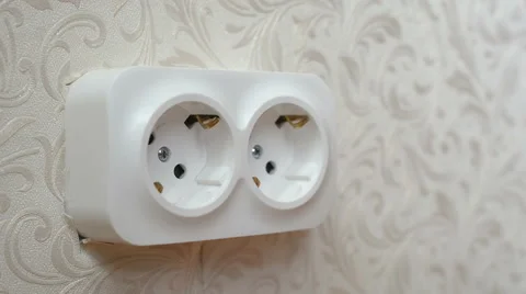 Enabling and disabling plug into the wall socket Stock Footage 56139598