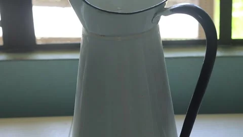 Enamel water jug Video stock 343324876