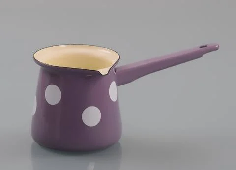 Enameled pot with handle Stock Photos
