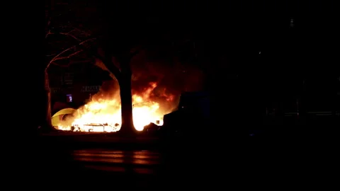 Encampment fire tent on fire in the winter propane tank explosion. Stock Footage 297500642