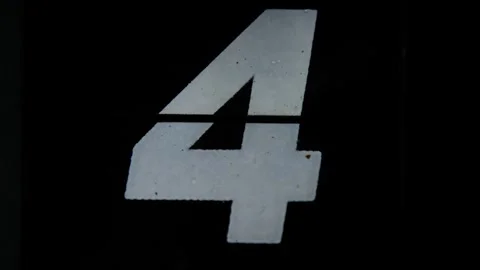 Encapsulating the essence of the bygone analog era, this slow-motion macro shot Stock Footage 257450076