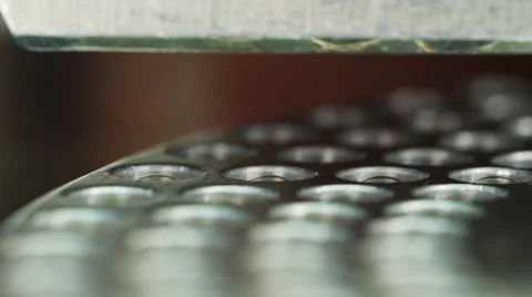 Encapsulator Loading Empty Vitamin or Pill Capsules Into Loading Trays Stock Footage 50051699