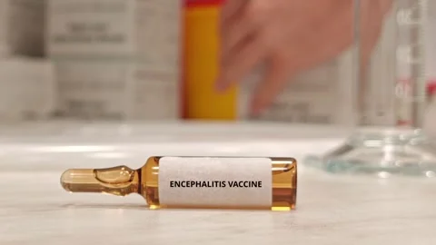 ENCEPHALITIS VACCINE for active immunization against selected Vídeo Stock 347026311