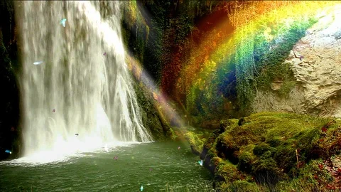 Enchanted waterfall with a rainbow. Stock Footage
