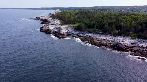 Enchanting Indian Harbor with Tree-Lined Banks in Canada Stock Footage 244040343