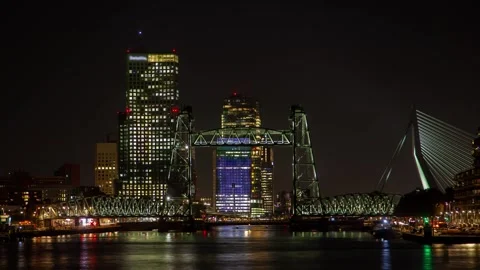 Enchanting timelapse of a bright bridge over a peaceful river in Rotterdam Stock Footage 312929535
