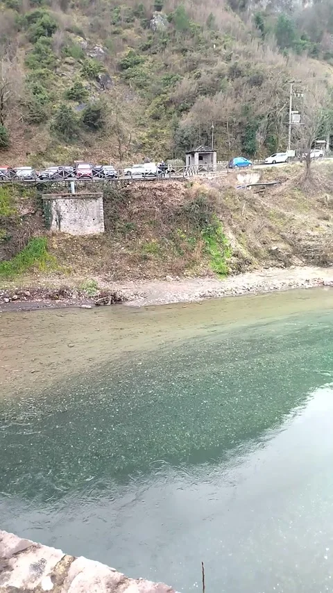 Enchanting view from the round stone bridge on the river Video stock 303759225