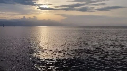 The enchanting view of the weighing beach when the sun sets in the afternoon Stock Footage 225485909