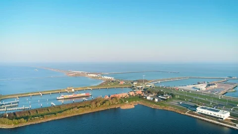 Enclosure Dam (Afsluitdijk): Cargo Ship, Bridge Opening- Holland – 4K Drone Video stock 127569545