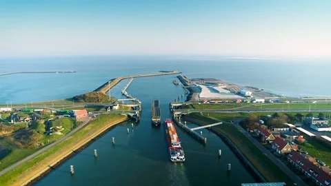 Enclosure Dam (Afsluitdijk): Cargo Ship, Bridge Opening- Holland – 4K Drone Stock Footage 127569954
