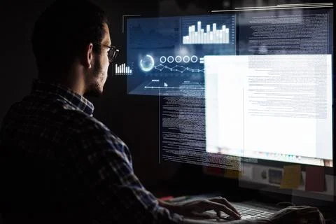 Encoding in progress. Cropped shot of a young computer programmer looking Foto stock