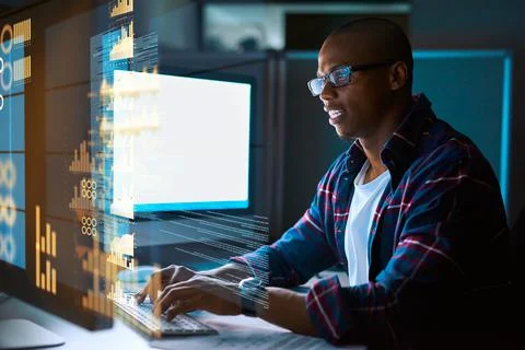 Encoding in progress. Cropped shot of a young male programmer working on Foto stock