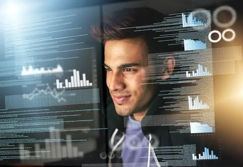 Encoding in progress. a handsome young male computer programmer working on new Foto stock