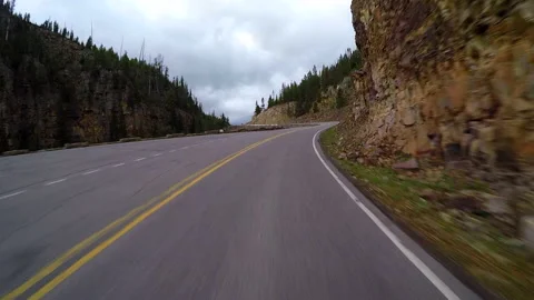 Encounter waterfall driving thru mountains Stock-Footage 131581587