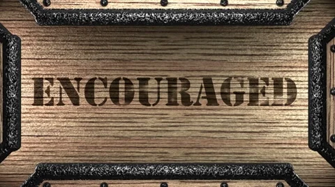 Encouraged on wooden stamp Stock Footage