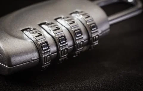 Encryption pad lock key password protection, dark tone. Stock Photos