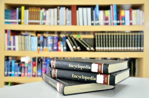 Encyclopedie book in library Stock Photos