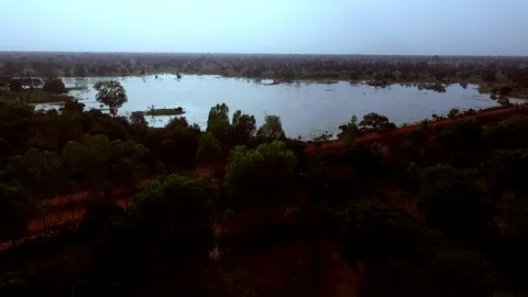 End afternoon sun's reflection on the lake Stock Footage 80805449