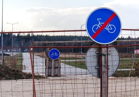 End of bicycle path sign with a blue circular sign and red diagonal line Stock Photos