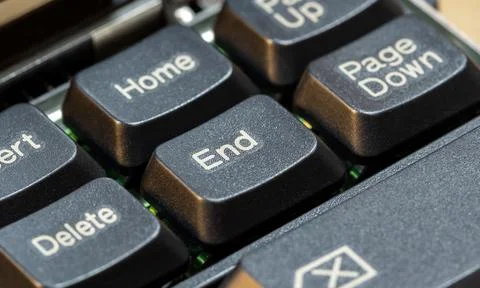 End button key on a simple laptop computer keyboard, macro detail, extreme .. Stock Photos