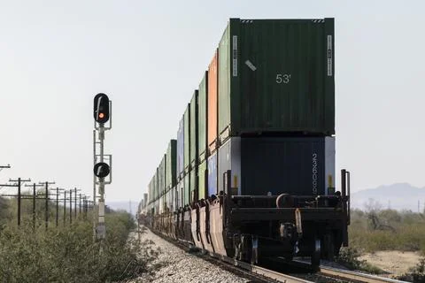 End of container stack train going away from viewer 스톡 사진