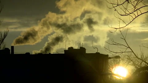 End of day at office showing close up office roof and sundown orange red sky Video stock 101581653