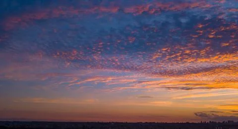 End of the day with a sky between clouds and very colorful Stock Photos