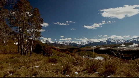 End Fall Colors Snow Mts Stock Footage 105040272