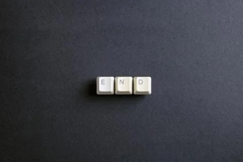 The end. Flat lay view from above on computer keyboard keys buttons. Foto stock