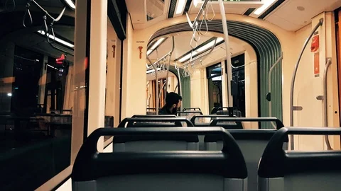 At the end of the hard working day, tired man going home with tram late at night Stock Footage 96910150