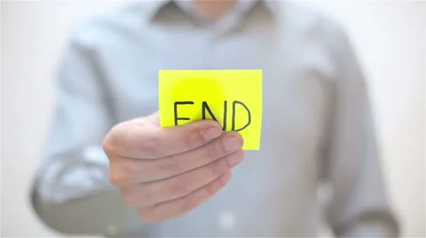 End. A man sticks a note on transparent screen Stock Footage 68088685