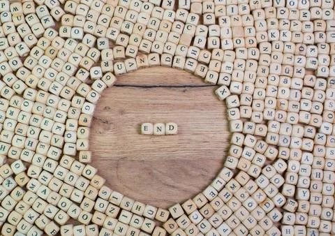 End name in letters on cube dices on table Fotos Stock