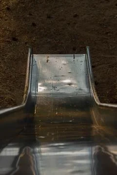 End of an old fashioned silver slide Stock Photos